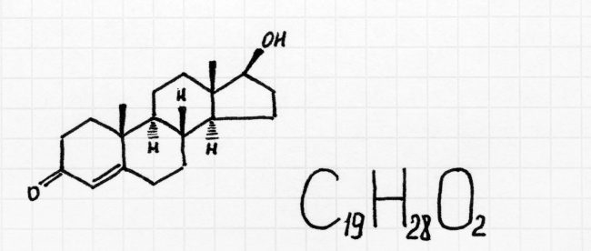 Ink drawing of a chemical molecule on graph paper.